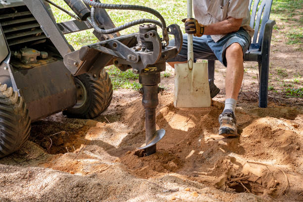 Kako instalirati kopač rupa za stupove na traktor