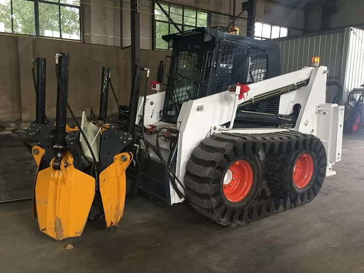 Pala d'arbre per a tractor carregador: tipus, components, principi de funcionament i aplicacions